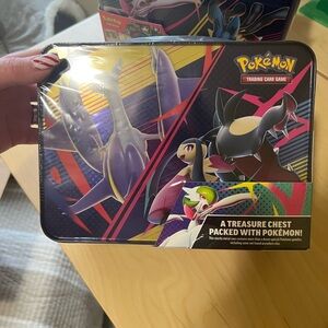 Pokemon TCG Lunchbox Treasure Chest Tin - Purple, Black, Yellow